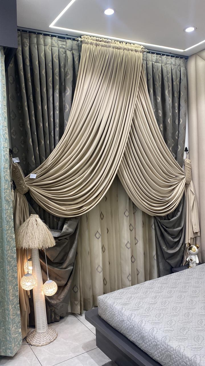 Champagne swag curtain in a luxury living room